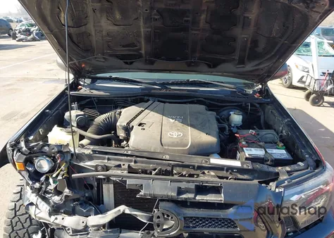 2013 Toyota Tacoma Base V6 z USA, uszkodzony, nr VIN 3TMLU4EN6DM132373